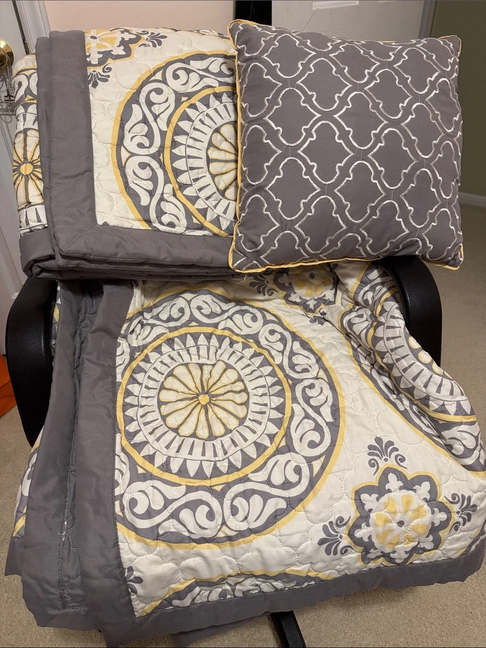 Gray and yellow quilted bedspread with 2 matching shams and 1 throw pillow